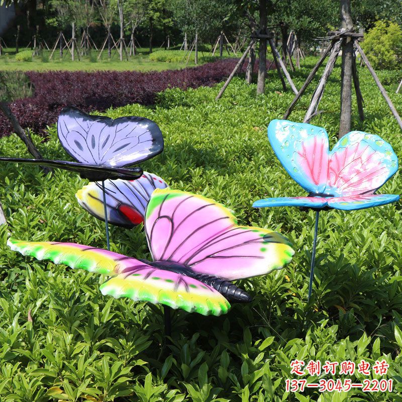 仙桃展翅的蝴蝶,公园草丛仿真动物装饰雕塑